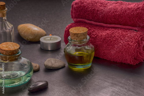 Photography zen basalt stones and aroma oil on the stone background
