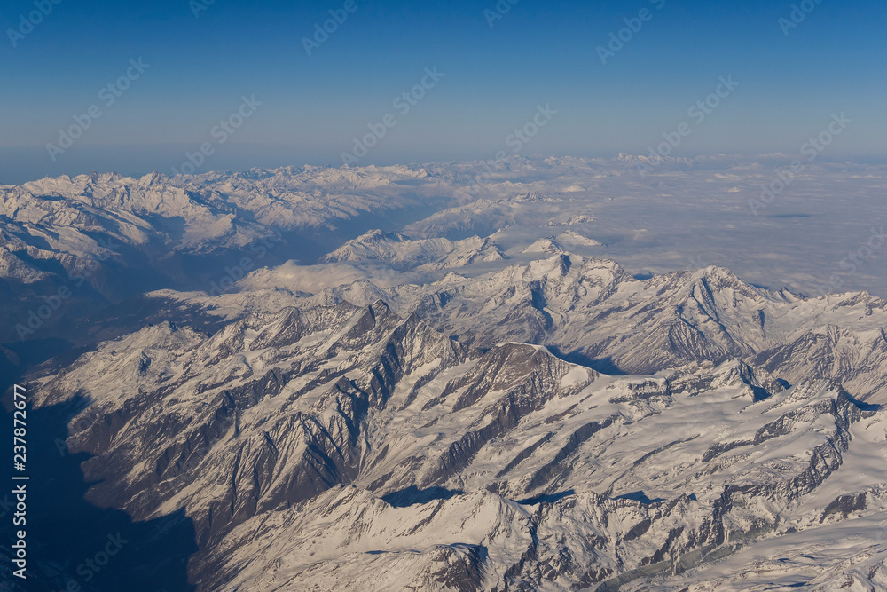 Fototapeta premium flight plane window view alps landscape
