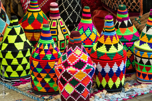 Colorful woven souvenirs in typical patterns and colors for sale in the old medina of Essaouira, Morocco, Africa, a seaside town on the Atlantic coast