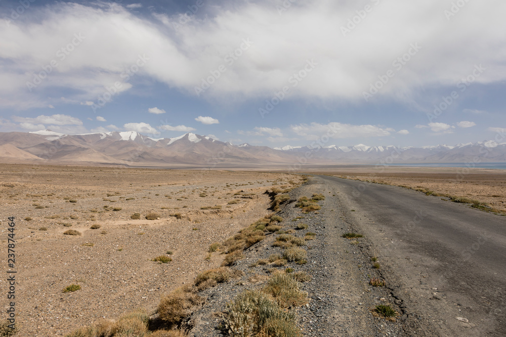 Desert-like landscape along the famous Pamir Highway in Tajikistan Desert-like landscape along the famous Pamir Highway in Tajikistan
