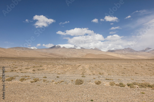 Desert-like landscape along the famous Pamir Highway in Tajikistan
