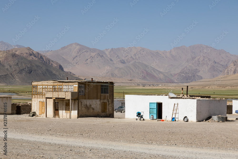 Naklejka premium Some residential buildings on the outskirts of Murghab in Tajikistan