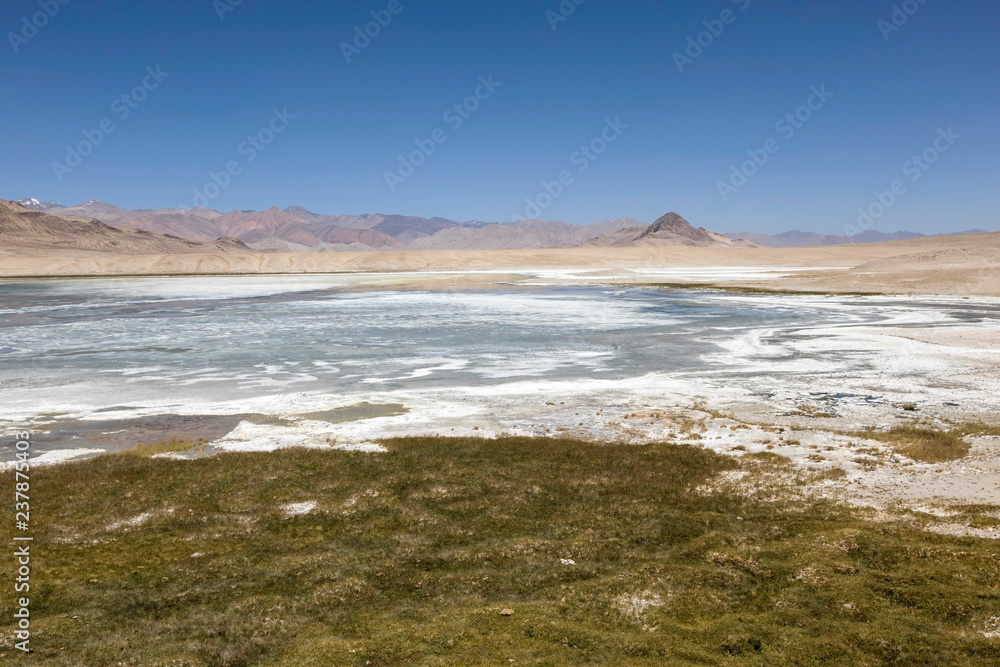 Landscape with salt lakes in the Pamir mountains near Alichur in Tajikistan
