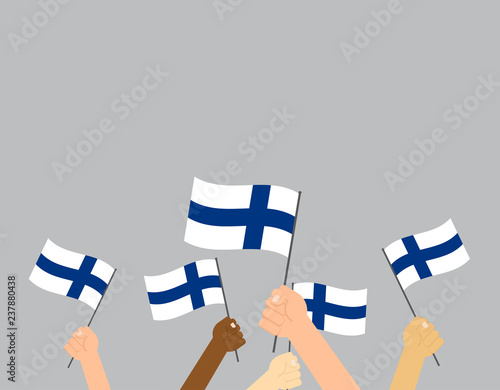 Vector illustration hands holding Finland flags on gray background 