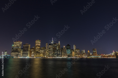 Manhattan skyline panorama with Times Square lights at dusk, New York City © A_Skorobogatova