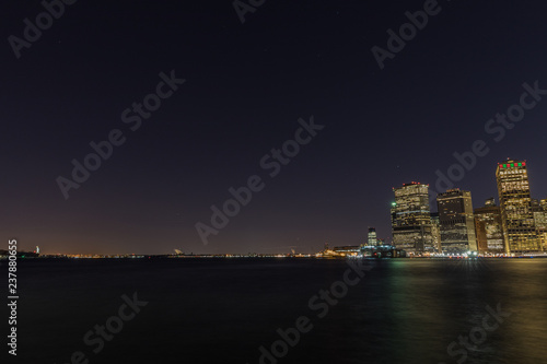 Manhattan skyline panorama with Times Square lights at dusk, New York City