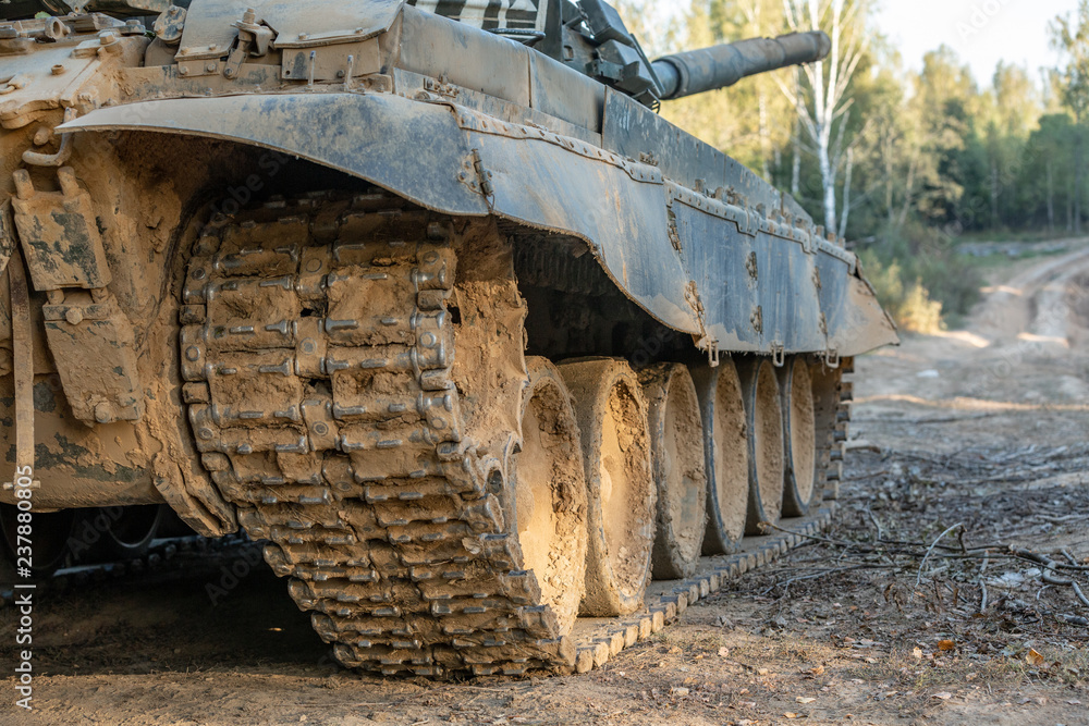 Military tank track,close up view. Military concept. Tank on exercises. Military tank track,close up view. Military concept. Tank on exercises.