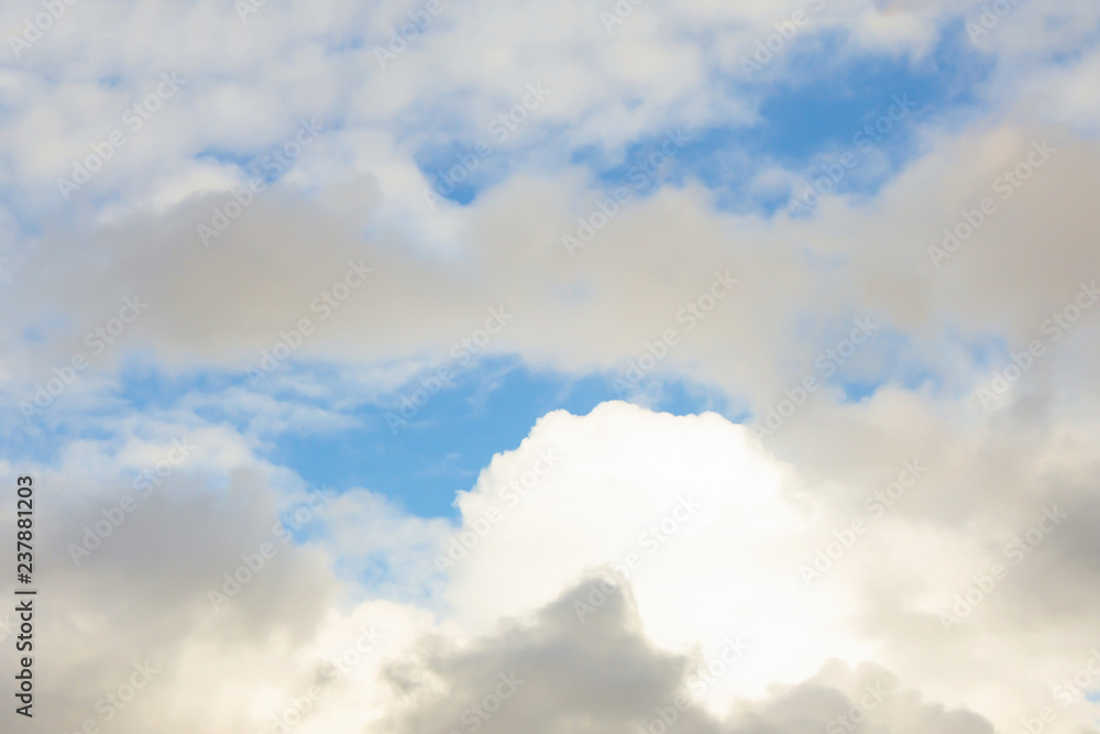 Fototapeta premium cumulus clouds lighted background airy light base relaxation relaxed with sunlight high in the sky