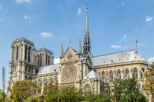 Notre Dame Cathedral, Paris, France, against a blue sky.