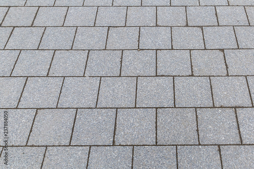 gray tiles square blocks part of the city square smooth surface with lines of a set of stones site basis design