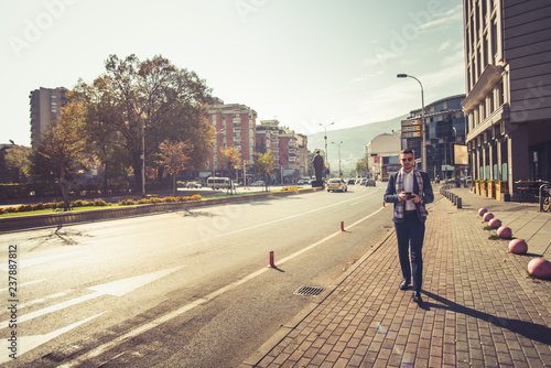 Modern man walking down the street