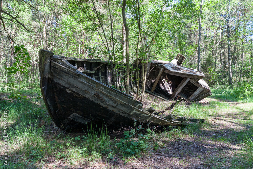 old abandoned wooden boats in the forest old abandoned wooden boats in the forest