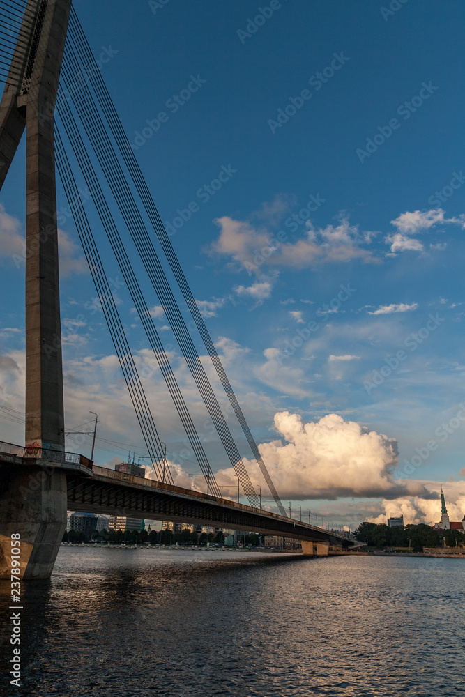Obraz premium Riga city, capital of Latvia panoramic view with river Daugava and cable bridge