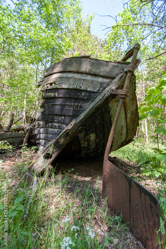 old abandoned wooden boats in the forest