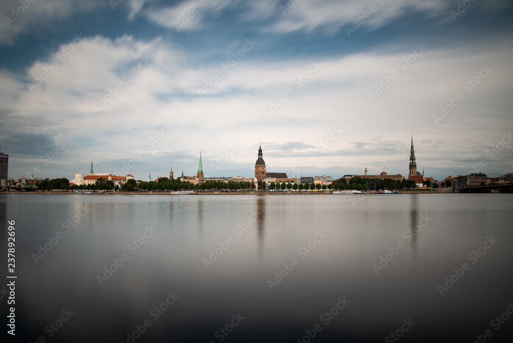 Naklejka premium Riga city, capital of Latvia panoramic view with river Daugava and cable bridge