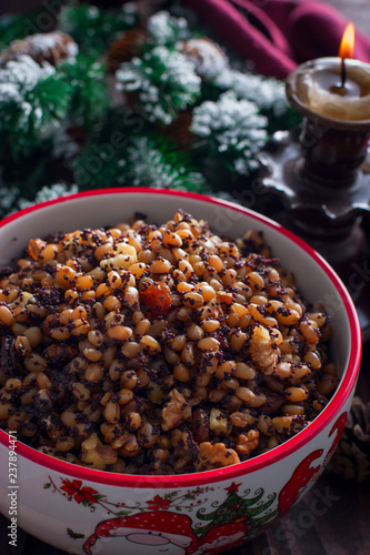 Christmas kutia from wheat, raisins and nuts, selective focus