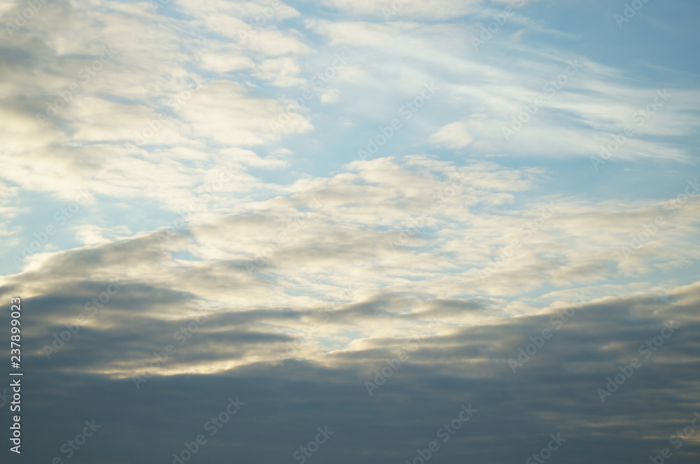 blue sky with clouds in december background