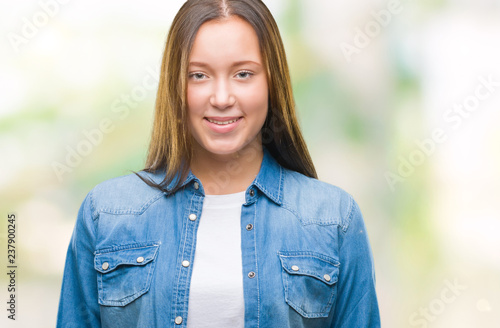 Young caucasian beautiful woman over isolated background with a happy and cool smile on face. Lucky person.