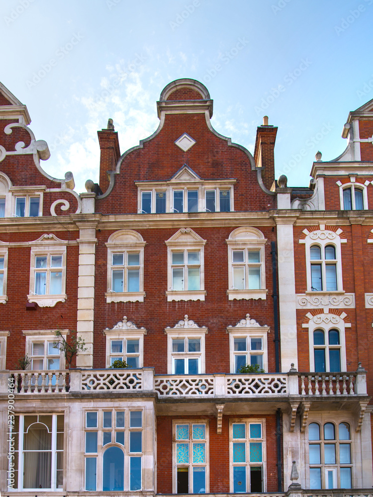 Fototapeta premium London, UK. Residential area of Kensington and Chelsea. Row of periodic buildings. 