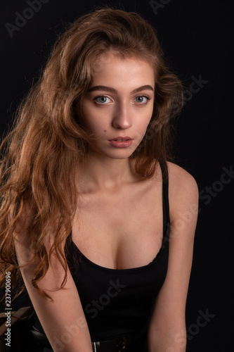 Close up portrait of a young girl in a black t-shirt