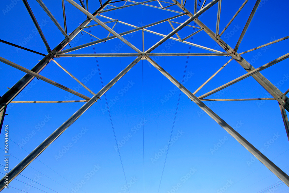 Obraz premium Electric power tower bottom view