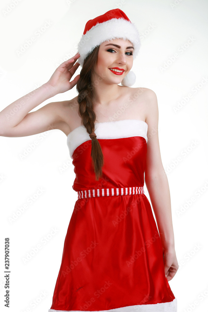 Beautiful smiling female model wear santa hat Beautiful smiling female model wear santa hat