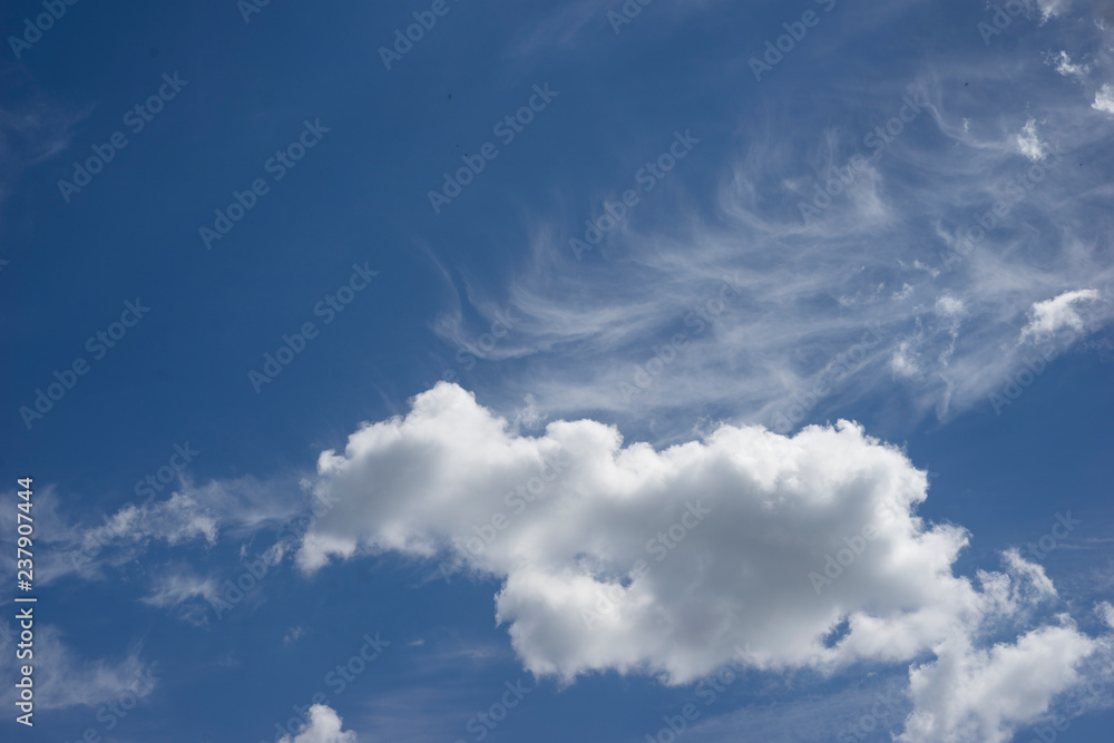 Blue sky with one cloud, freedom and summer sunny background Blue sky with one cloud, freedom and summer sunny background