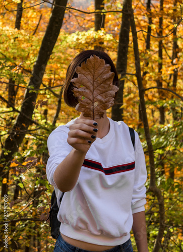 Girl Holding a Leaf
