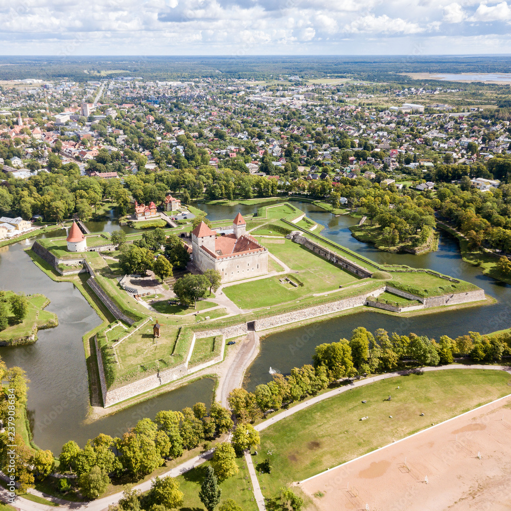 Fortifications of Kuressaare episcopal castle (star fort, bastion fortress) built by Teutonic Order, Saaremaa island, western Estonia, aerial view.