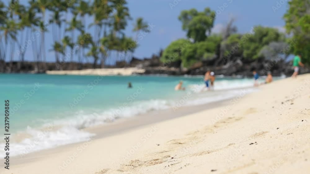 Travel vacation Woman relaxing on beach walking into water going swimming in ocean on vacation. Beautiful young model bikini girl living happy beach life lifestyle, Travel vacation Woman relaxing on beach walking into water going swimming in ocean on vacation. Beautiful young model bikini girl living happy beach life lifestyle,