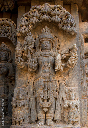 Artistic stone sculptures and Carvings of Hindu Goddesses and Goda at Somanathapura temple in Karnataka, India © mblindia