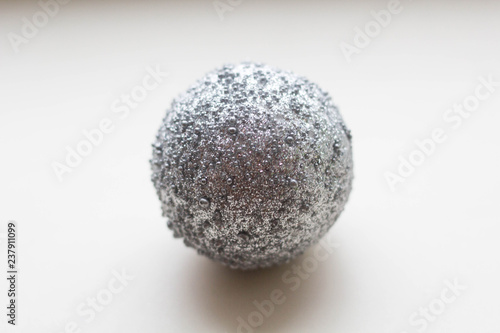 gray christmas ball on white background close up