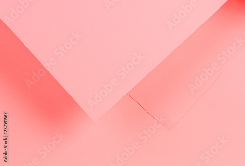 Abstract geometric shape living coral color paper background