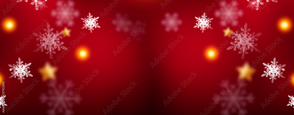 Red sparkling background with stars and snowflakes, the magical atmosphere of the Christmas holidays. Red bokeh background with snowflakes. Empty winter background, snowy, celebratory, sparks and star