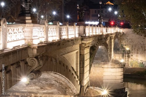 Night image of Ponte Giuseppe Mazzini in Rome Italy Crossing Tiber River photo