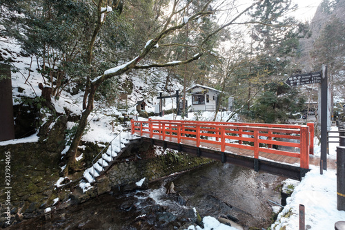 Wooden Red Bridge in Winter Snow at Kibune, Shiga, Kyoto