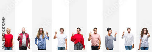 Collage of different ethnics young people over white stripes isolated background showing and pointing up with fingers number two while smiling confident and happy.