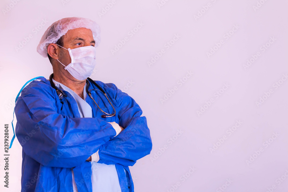 Health professional with his uniform on a neutral background. Health professional with his uniform on a neutral background.