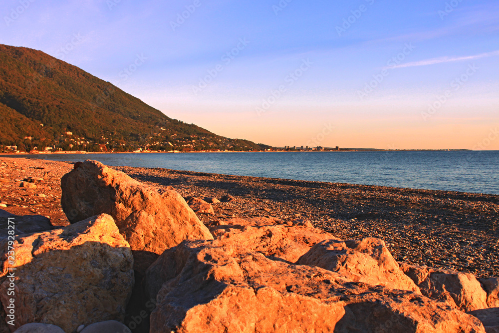 Stones by the sea at sunset,Gagra, Abkhazia