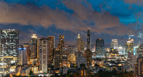 Cityscape Bangkok skyline at night  Thailand. Bangkok is metropolis and favorite of tourists live at between modern building   skyscraper.