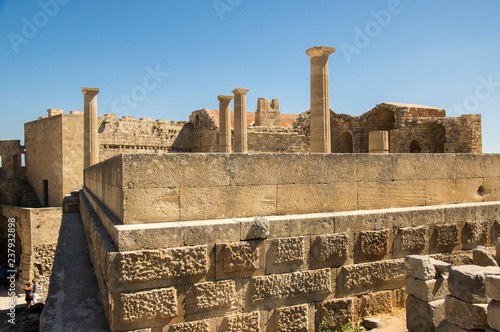 Lindos Acropolis fortified citadel during summer touristic season, archeology ruins