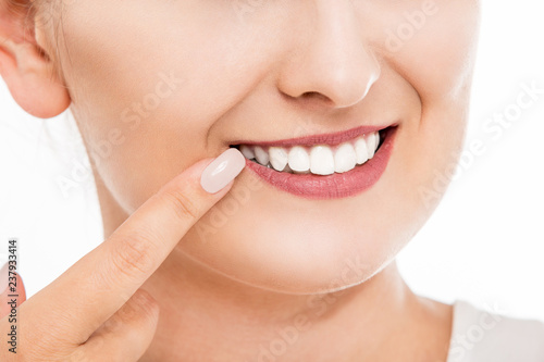 Fototapeta Naklejka Na Ścianę i Meble -  Woman smiling with beautiful teeth