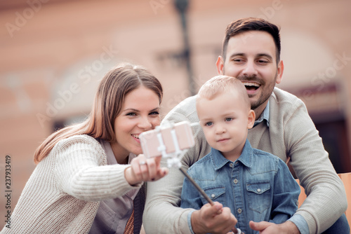 Happy family taking selfie together