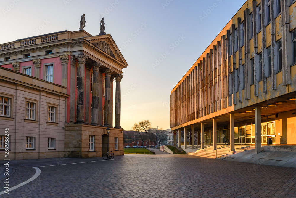 Outdoor scenery of buildings around street and am alten markt, old historical market square, in Potsdam, Germany in sunset time.
