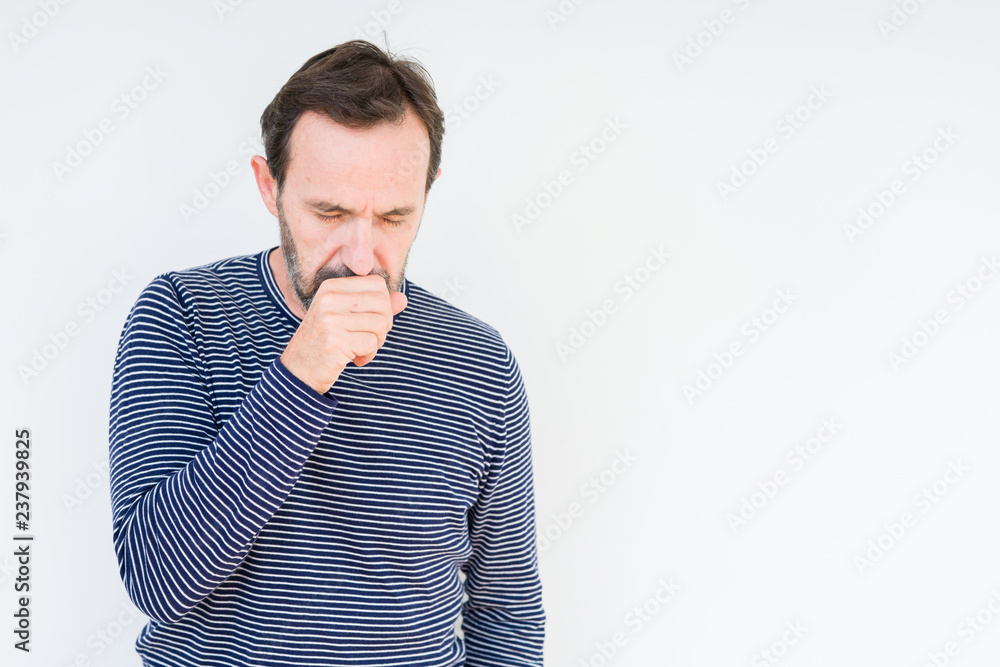 Handsome senior man over isolated background feeling unwell and coughing as symptom for cold or bronchitis. Healthcare concept. Handsome senior man over isolated background feeling unwell and coughing as symptom for cold or bronchitis. Healthcare concept.