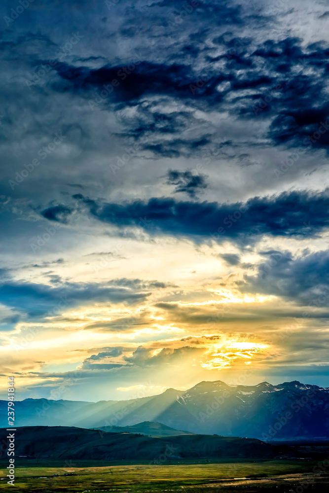 Sun Rays through Clouds at Sunset Sun Rays through Clouds at Sunset