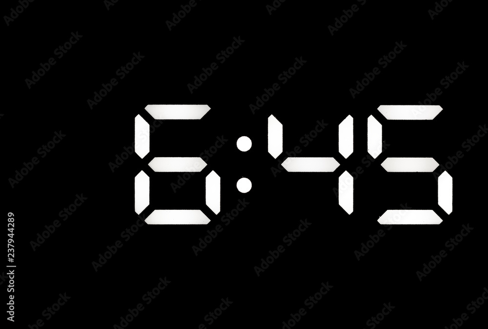 Real white led digital clock on black background Real white led digital clock on black background