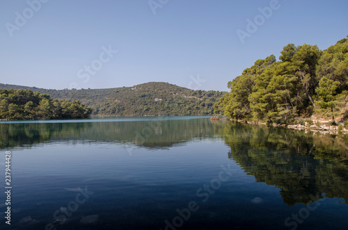 the big lake in the morning, seascape at mljiet island national park. big lake coast. croatia, dalmatia. © marinzolich