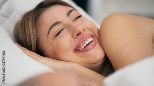 Difficulties in the relationship of men and women, a young couple is worried about relationships, insincere sex, in bed make love, sexual relations between a pumped man and a young woman