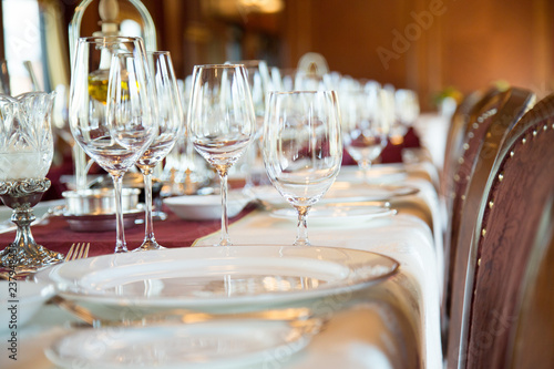 Place setting with lots of wine glasses